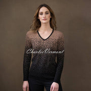 Super soft viscose mix V-neck long sleeve sweater with 2 tone gradient knit effect. V-neck Long Sleeves 2 tone Gradient effect Jacquard knit Classic fit.