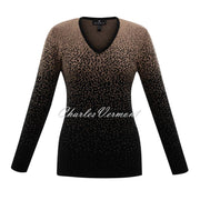 Super soft viscose mix V-neck long sleeve sweater with 2 tone gradient knit effect. V-neck Long Sleeves 2 tone Gradient effect Jacquard knit Classic fit.