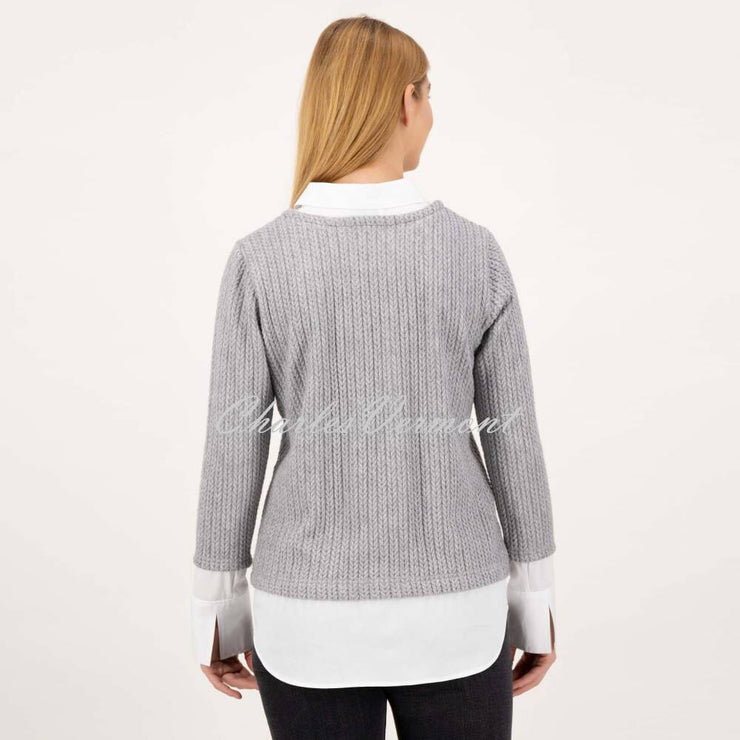 Blouse and jumper in one shop